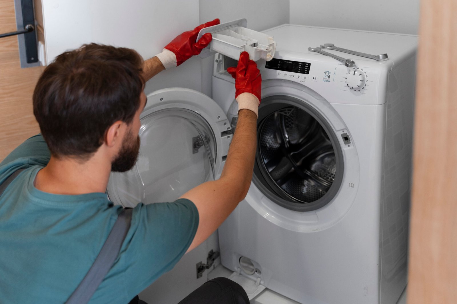 Technician Repairing Machine